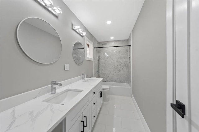 bathroom featuring double vanity, baseboards, tub / shower combination, and a sink