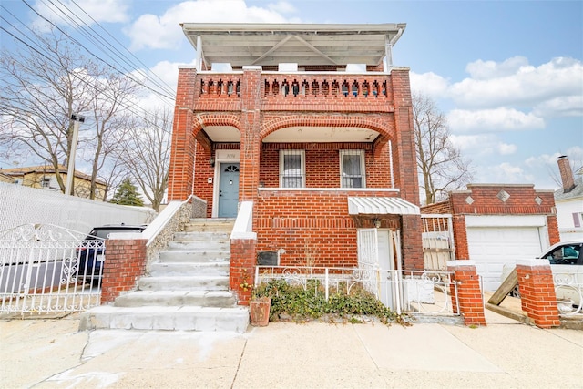 view of front facade featuring a balcony, an attached garage, fence, and brick siding