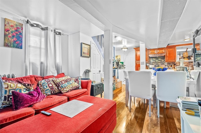 living area featuring hardwood / wood-style flooring