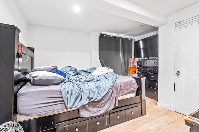 bedroom with light wood-style flooring