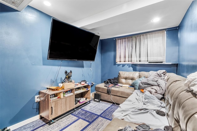 living area with recessed lighting and baseboards