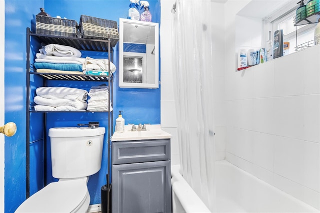 bathroom with vanity, toilet, and shower / bathtub combination with curtain