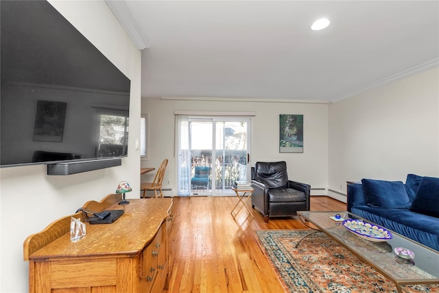 living area with light wood-type flooring, crown molding, recessed lighting, and a baseboard radiator