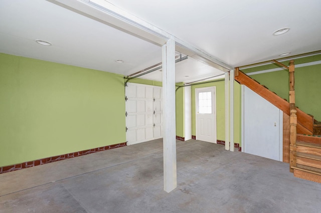 garage with baseboards