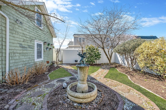 view of yard featuring fence