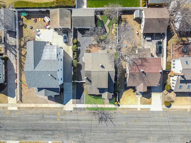 birds eye view of property with a residential view