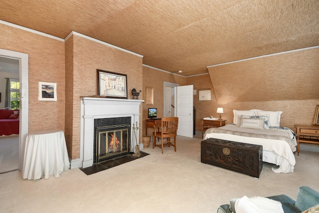 bedroom featuring ornamental molding, carpet, and a fireplace with flush hearth