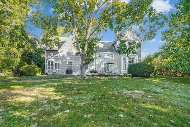 view of front of house with a front yard