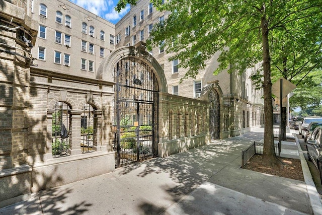 view of gate featuring fence