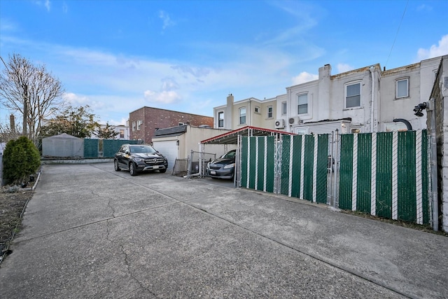 view of car parking with fence