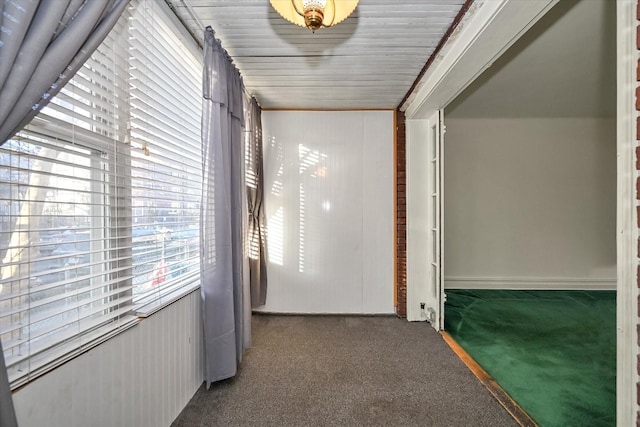 hallway featuring carpet floors