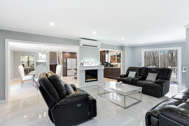 living area with recessed lighting, crown molding, an AC wall unit, and a glass covered fireplace