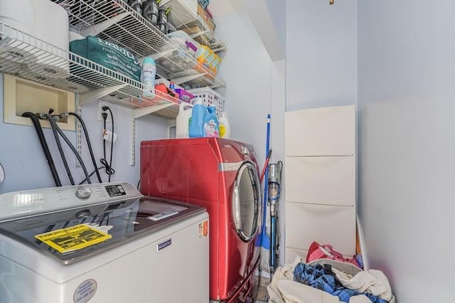 washroom featuring laundry area and independent washer and dryer