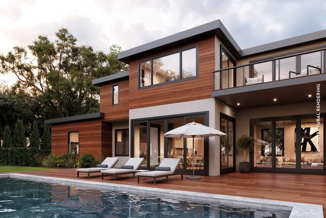 rear view of property featuring a balcony, an outdoor pool, and stucco siding