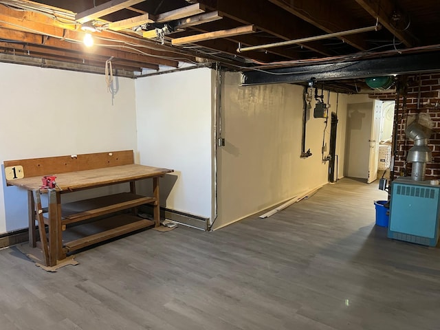 unfinished basement with wood finished floors