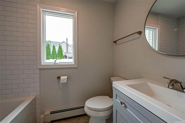 bathroom featuring baseboard heating, vanity, and toilet