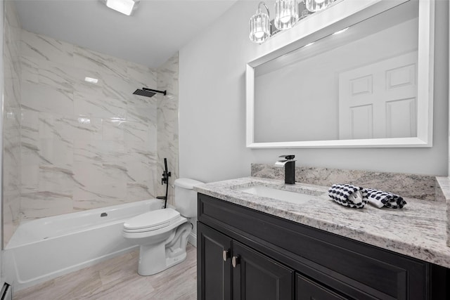 full bathroom with washtub / shower combination, vanity, and toilet