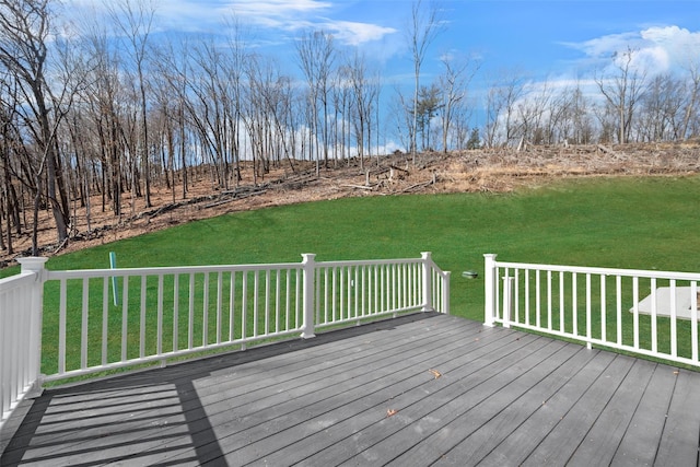 wooden deck with a yard