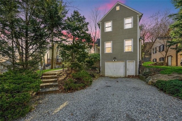 view of front facade with an attached garage and driveway