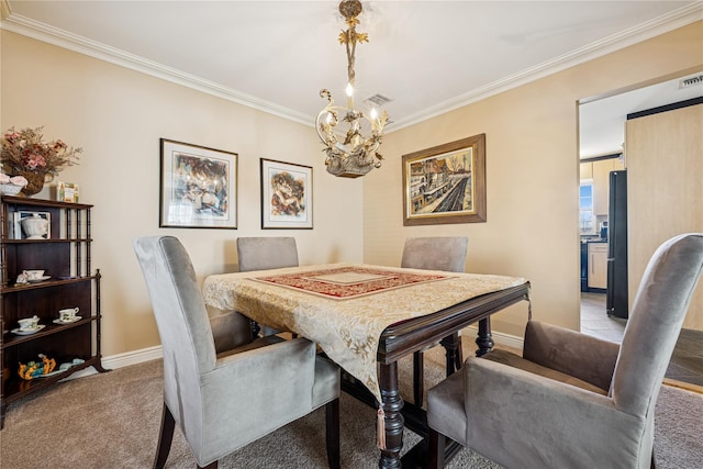 dining area featuring visible vents, baseboards, ornamental molding, light carpet, and a notable chandelier