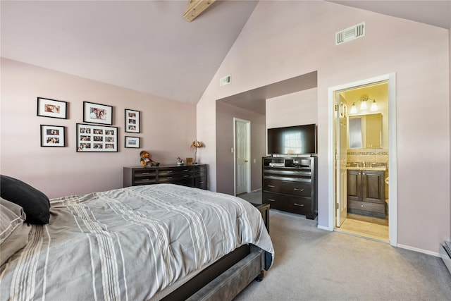 carpeted bedroom featuring ensuite bath, visible vents, high vaulted ceiling, and baseboards