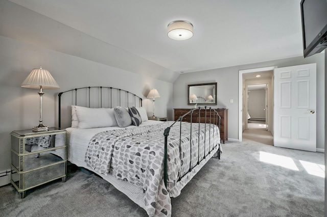 bedroom featuring lofted ceiling, carpet, baseboards, and baseboard heating