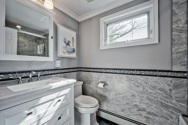 full bathroom featuring a stall shower, toilet, ornamental molding, vanity, and a baseboard heating unit