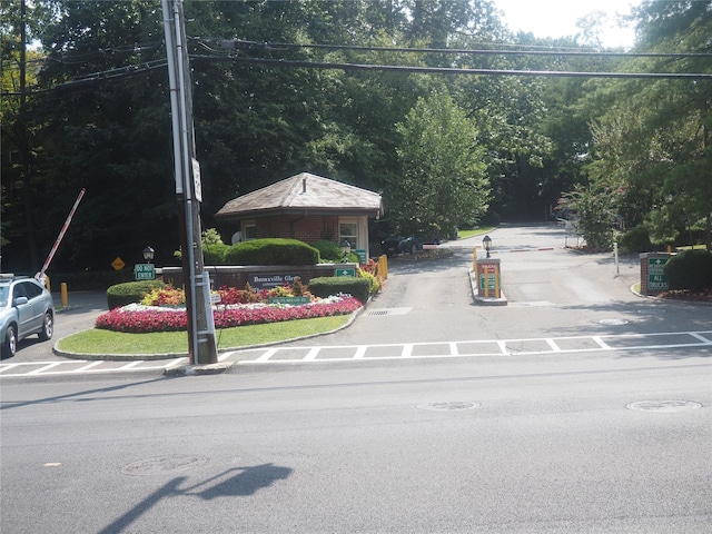 view of street with curbs