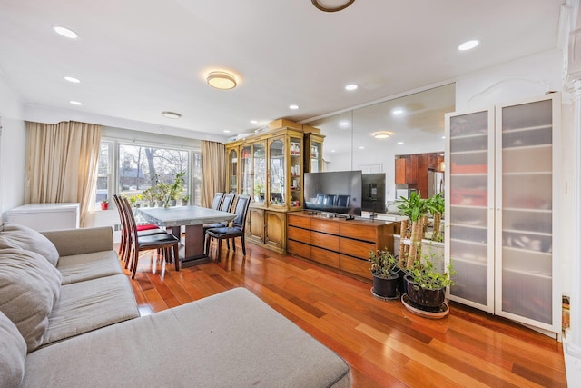 living room featuring wood finished floors and recessed lighting