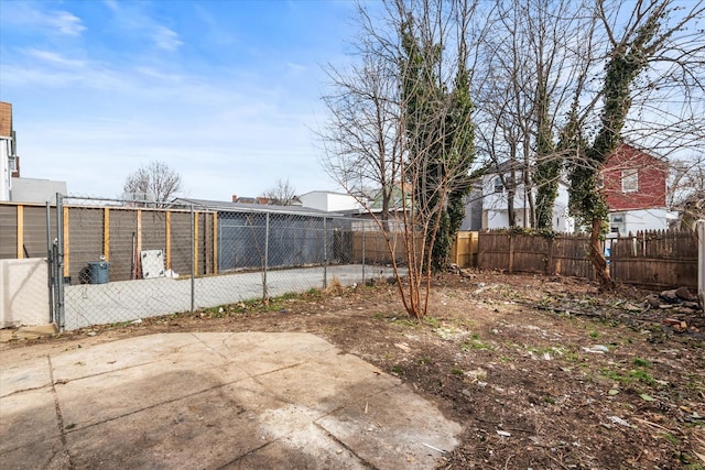 view of yard featuring a fenced backyard and a patio area