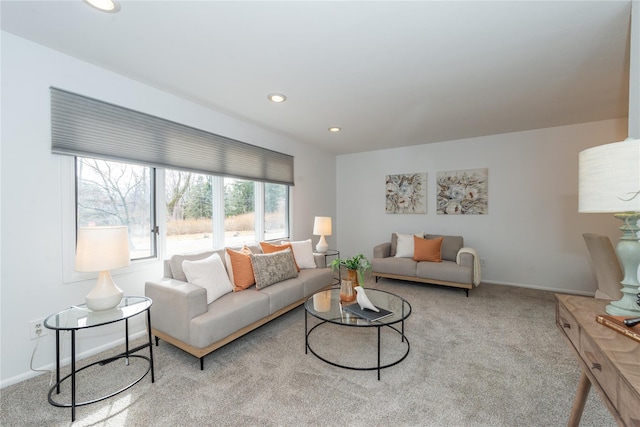 living room featuring recessed lighting, carpet flooring, and baseboards