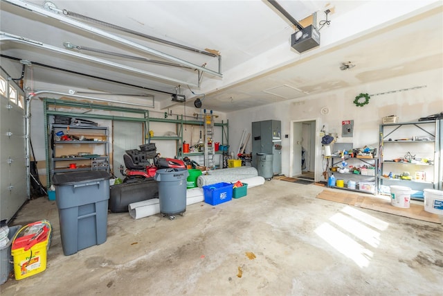 garage with electric panel and a garage door opener