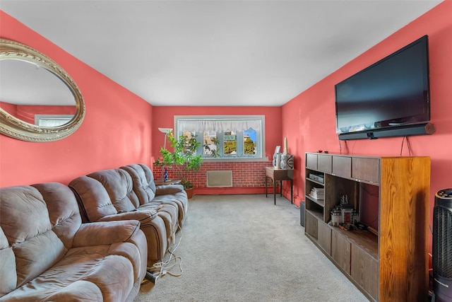 living area featuring carpet flooring