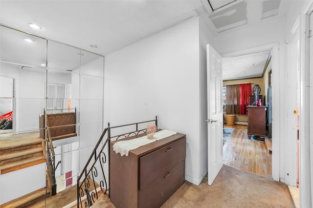 interior space featuring recessed lighting and light colored carpet