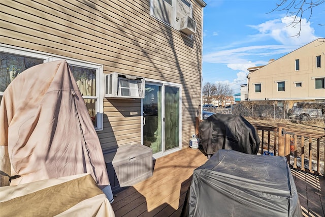 exterior space featuring cooling unit and a deck