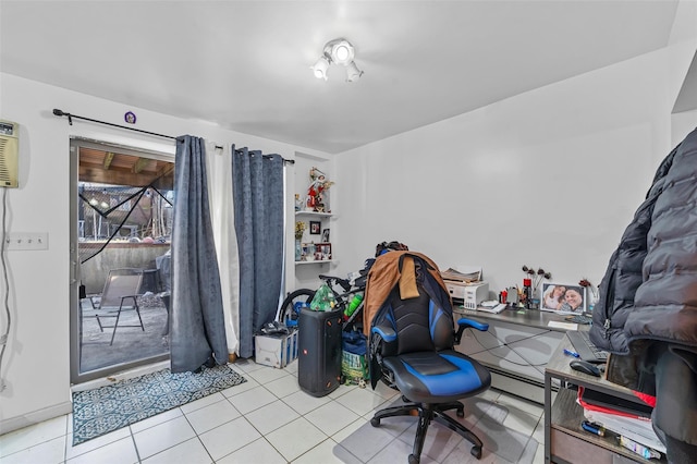 tiled home office featuring a wall unit AC