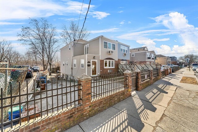 3296 Griswold Ave, Bronx, NY 10465 - view of front of property with a fenced front yard, a residential view, and a gate