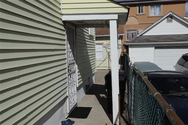 view of side of property featuring a garage