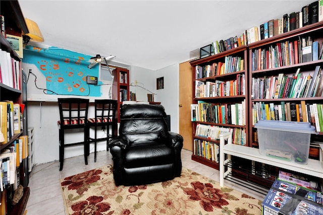 living area with tile patterned flooring