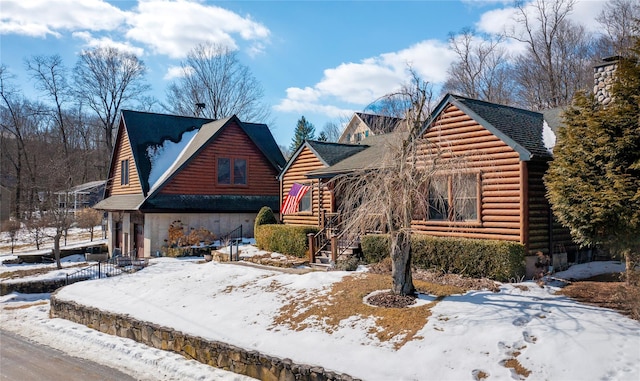 view of front of property featuring a chimney