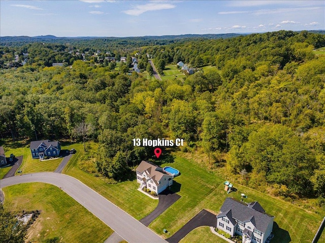 aerial view with a wooded view