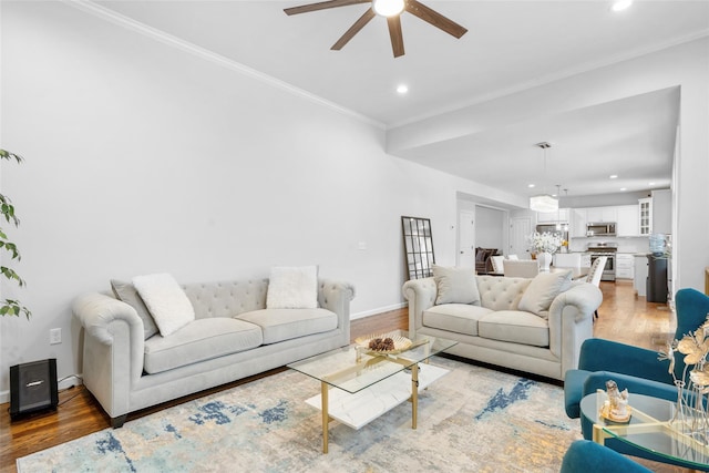 13 Hopkins Ct, Washingtonville, NY 10992 - living area featuring a ceiling fan, recessed lighting, light wood-style floors, crown molding, and baseboards