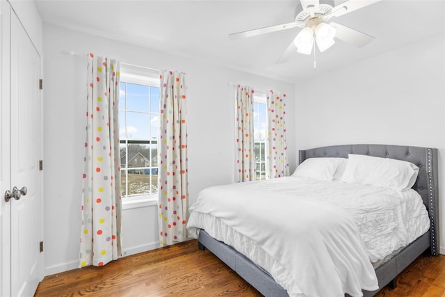 13 Hopkins Ct, Washingtonville, NY 10992 - bedroom featuring ceiling fan, multiple windows, and wood finished floors