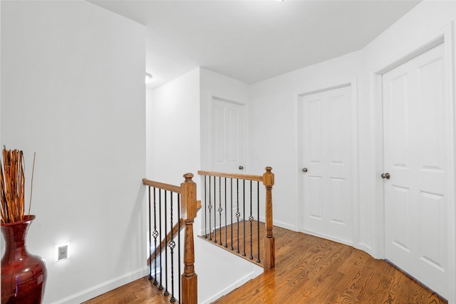 13 Hopkins Ct, Washingtonville, NY 10992 - corridor with wood finished floors, an upstairs landing, and baseboards