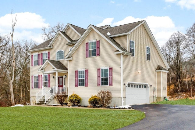 13 Hopkins Ct, Washingtonville, NY 10992 - view of front of property featuring a garage, a front lawn, roof with shingles, and driveway