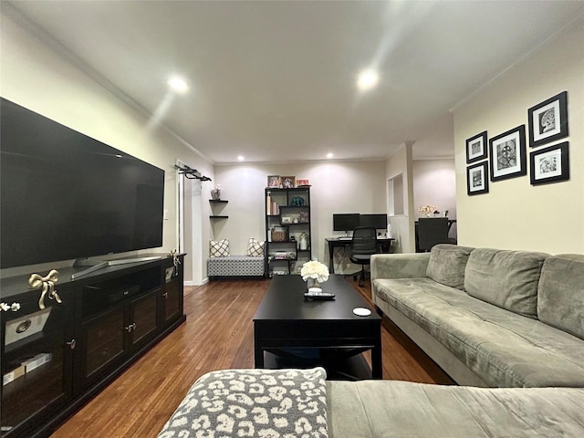 living area featuring crown molding, recessed lighting, and dark wood finished floors