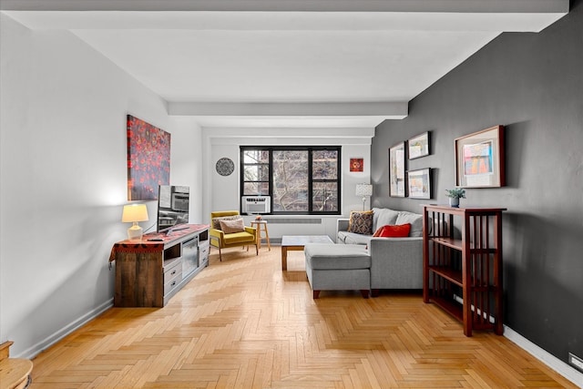 living area featuring cooling unit, baseboards, and beamed ceiling