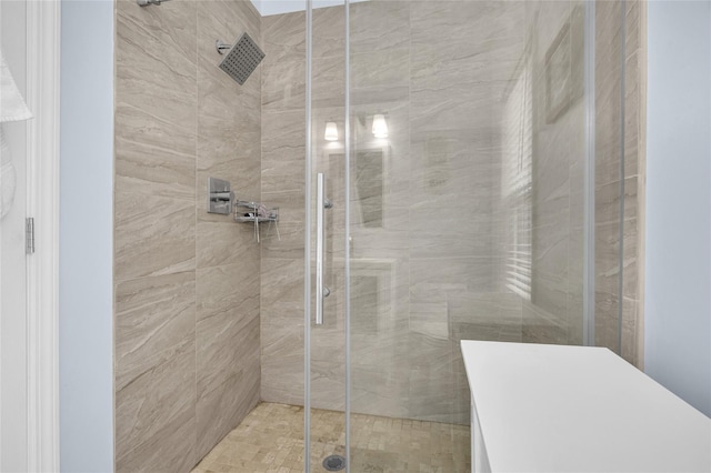 bathroom with a shower stall