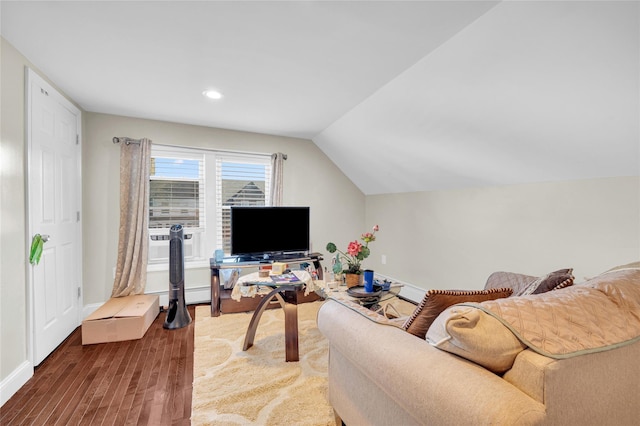 living area with vaulted ceiling, wood finished floors, and recessed lighting