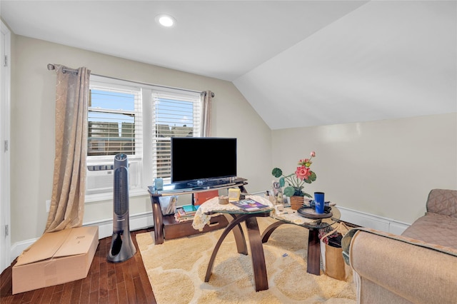 home office with cooling unit, recessed lighting, wood finished floors, vaulted ceiling, and baseboard heating